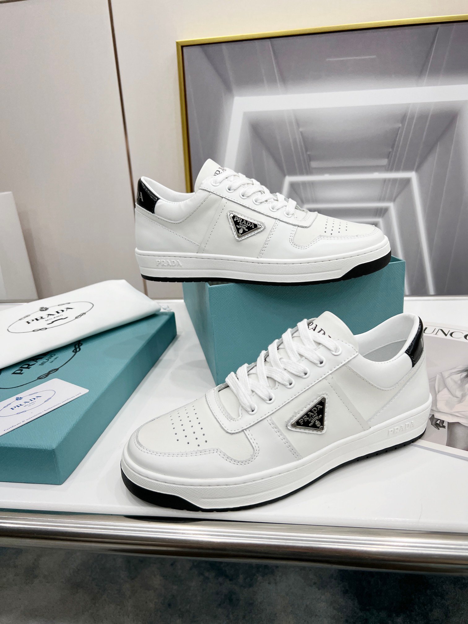 1a635b45.jpg Prada Downtown Perforated Sneakers White/Black For Women 1.2in/30mm PRD 1E792M_3LJ6_F0964_F_030 - Image 1