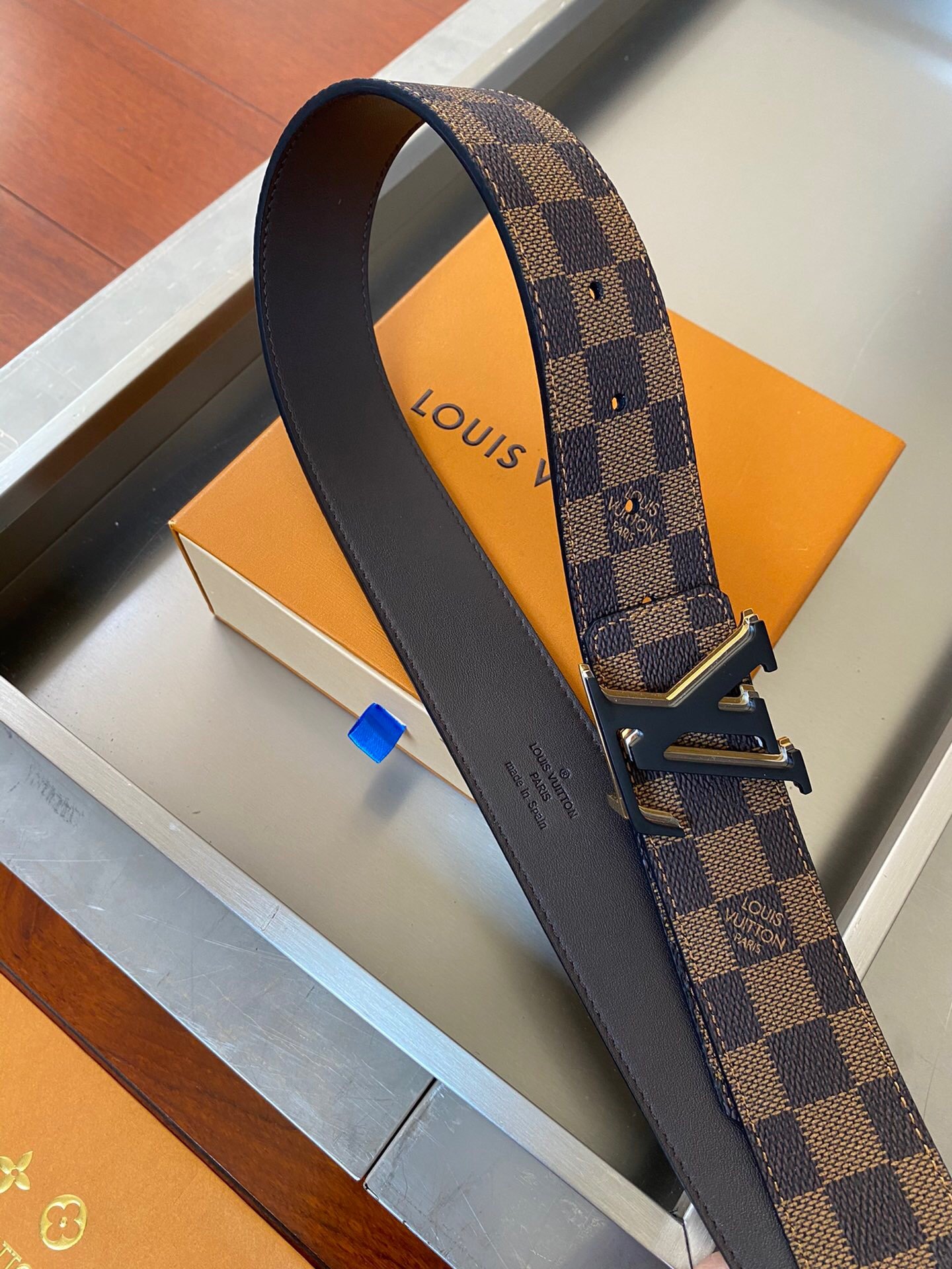 71b5388f.jpeg Louis Vuitton Initiales Reversible LV Belt Damier Ebene Canvas with Black Toned Hardware LV Belt - Image 1