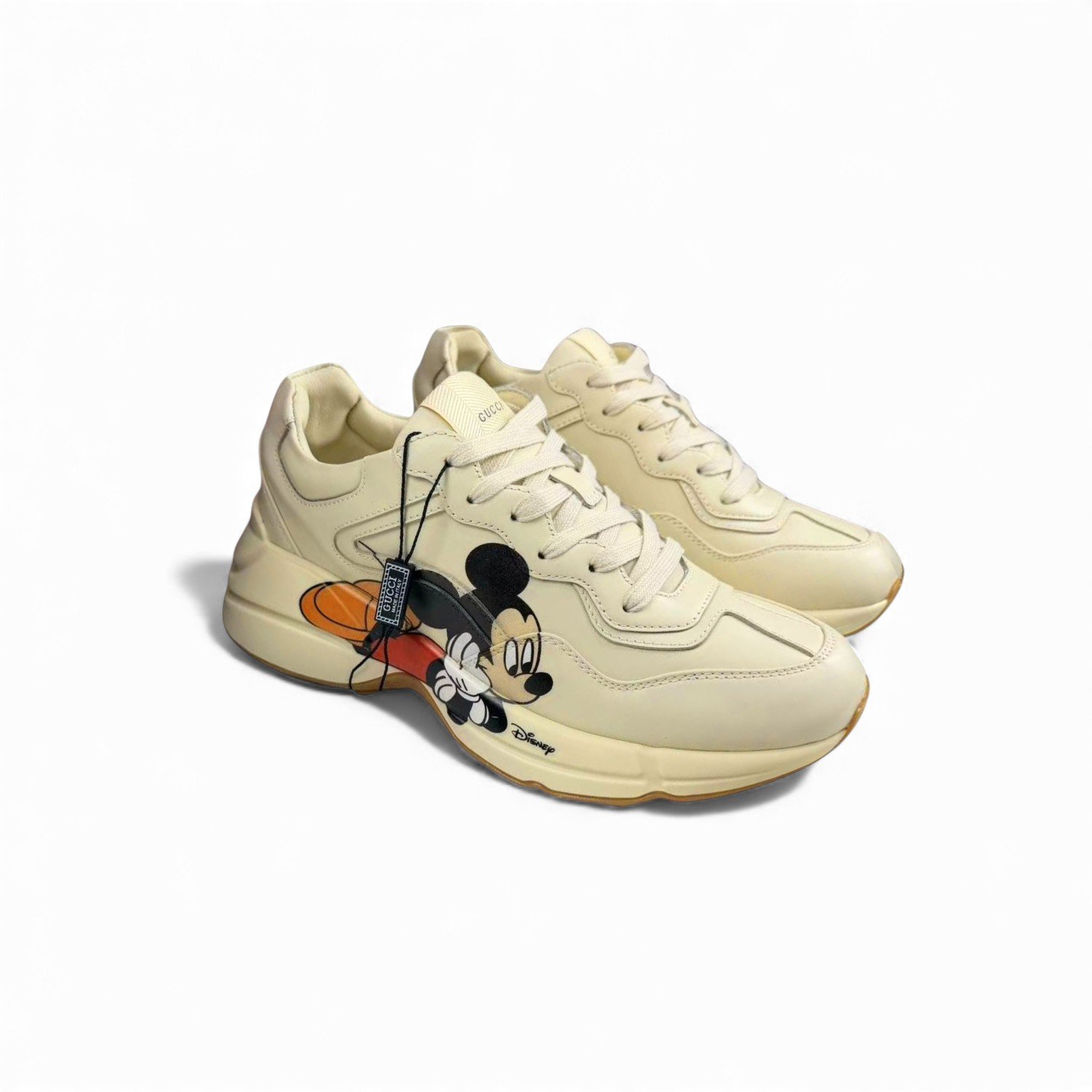 Gucci-Disney-Mens-Rhyton-Sneaker.jpg Gucci x Disney Women's Rhyton Sneaker With Mickey Mouse Beige For Women 602049 DRW00 9522 - Image 1