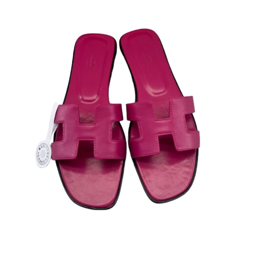 xr:d:DAFpzPnByXc:819,j:3396121853781653998,t:23103113 Hermes Oran Sandal Dark Pink For Women - Image 1