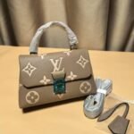 Louis Vuitton Madeleine BB Monogram Empreinte Dove Gray/ Creme Beige - Image 2