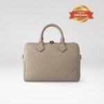 [True-to-ORIGINAL] Louis Vuitton Speedy Bandouliere 25 Top Handle Bag 9.8in/ 25cm Tourterelle Monogram Empreinte Gold Hardware For Women M59273 - Image 4